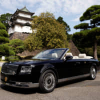 A special convertible car that will be used during Emperor Naruhito and Empress Masako\'s parade following the enthronement ceremony on Oct. 22 is displayed during a press preview at the Imperial Palace in Tokyo on Monday. | REUTERS