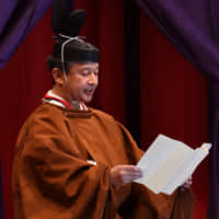 Emperor Naruhito delivers a speech during his enthronement ceremony at the Imperial Palace in Tokyo on Tuesday. | POOL / VIA REUTERS