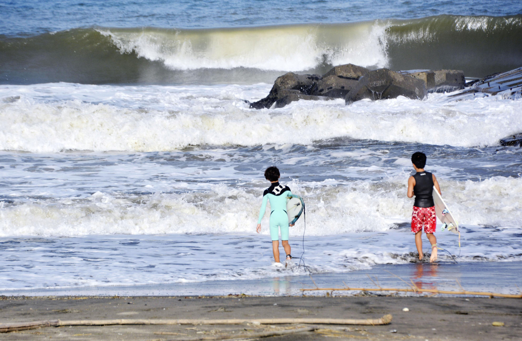 Surfers hit the waves at Tsurigasaki beach in Ichinomiya, Chiba Prefecture, which will host the surfing events for the Tokyo 2020 Olympics. | ??
