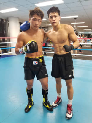 Monsters and men: Naoya 'The Monster' Inoue (right) and Japhethlee Llamido take a picture in the sparring ring in Yokohama. | HIDEKI SATO