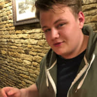 Harry Dunn, age 19, was killed in August when he was struck by a car traveling on the wrong side of the road. The driver suspected of causing the accident, the wife of a U.S. diplomat, claimed diplomatic immunity and returned to the U.S. with her family. | CHARLOTTE CHARLES
