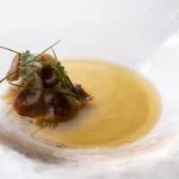 Umami-packed: Morsels of Hokkaido crab encased in slices of Yanomami mushrooms in a broth of dried mushrooms and kelp. | COURTESY OF COOK JAPAN PROJECT