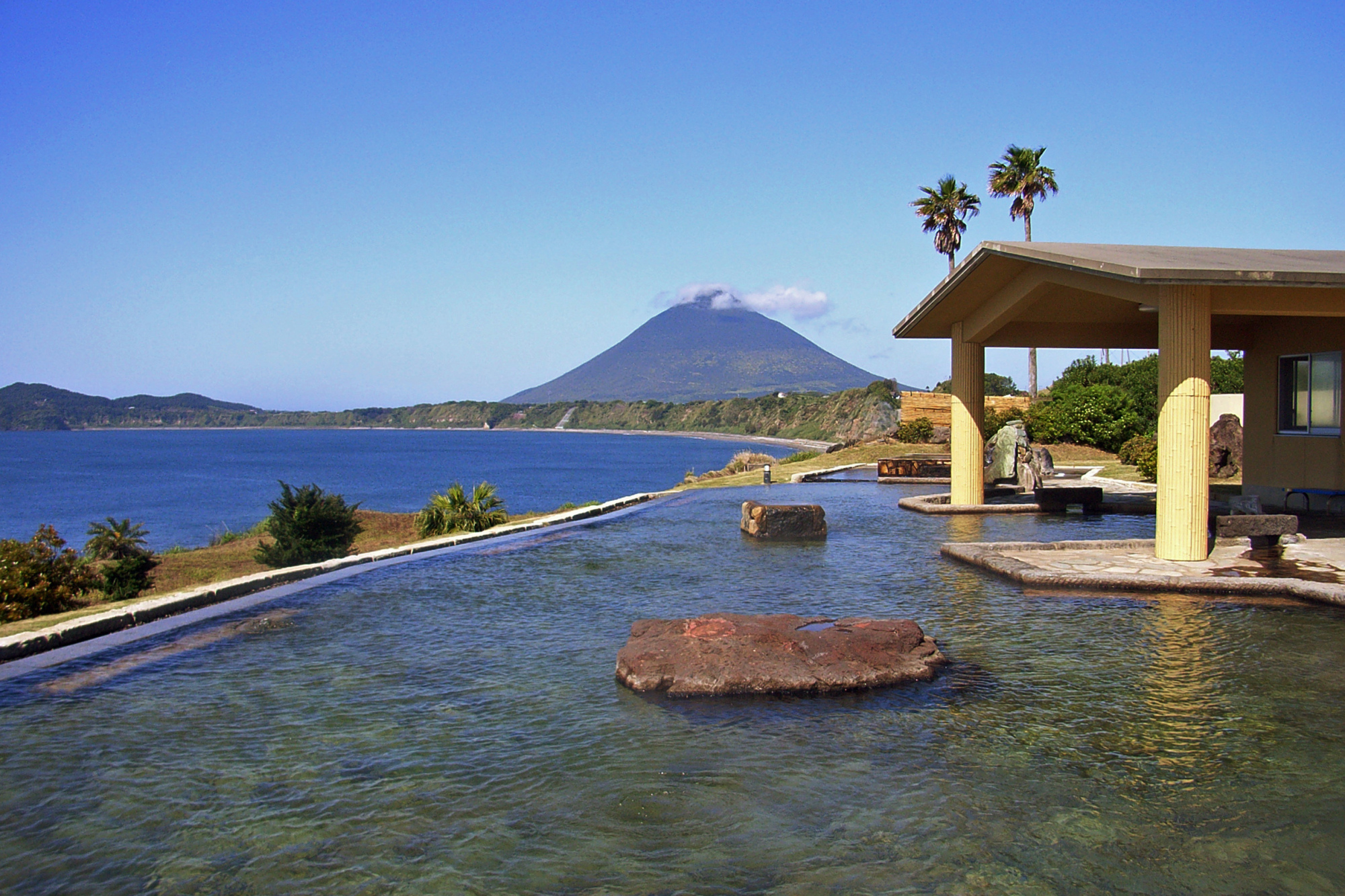 Bather-tested, bather approved: With its vantage point over volcanic Mount Kaimon, the view from HealthyLand Resort's Tamatebako onsen outdoor bath was ranked No. 1 in the country in 2017 on TripAdvisor. | COURTESY OF HEALTHYLAND RESORT
