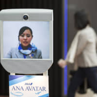 ANA and its competitors are betting that they can make money by keeping would-be travelers happily at home. | BLOOMBERG