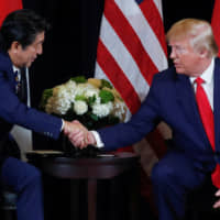 Prime Minister Shinzo Abe holds a meeting with U.S. President Donald Trump on the sidelines of the 74th session of the U.N. General Assembly in New York on Sept. 25. | REUTERS