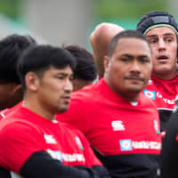 Japan head coach Jamie Joseph (left) leads a training session at Prince Chichibu Memorial Rugby Stadium on Thursday, ahead of Sunday\'s Rugby World Cup quarterfinal with South Africa. | AFP-JIJI
