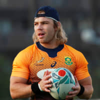 South Africa\'s Faf de Klerk holds the ball during a training session on Wednesday at Arcs Urayasu Park in Urayasu, Chiba Prefecture. | REUTERS