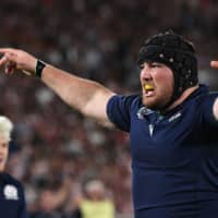 Scotland\'s Zander Fagerson celebrates after scoring a try in the second half on Sunday. | AFP-JIJI