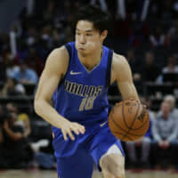 Mavericks guard Yudai Baba brings the ball up against the Pistons during the second half of a preseason game on Wednesday in Detroit. | AP