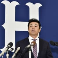 Carp manager Koichi Ogata speaks at a news conference on Tuesday in Hiroshima. | KYODO
