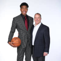 Washington Wizards first-round draft choice Rui Hachimura poses with GM Tommy Sheppard after an introductory news conference in June. | NBA PHOTOS