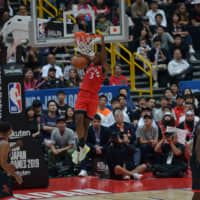 Toronto\'s OG Anunoby goes up for a dunk against Houston in NBA preseason action in Saitama on Tuesday night. | DAN ORLOWITZ