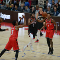 Houston\'s Shamorie Ponds goes up for a layup against Toronto in NBA preseason action in Saitama on Tuesday night. | DAN ORLOWITZ