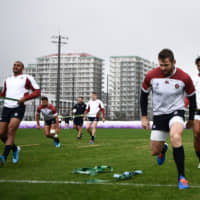 England\'s players take part in a training session in Urayasu, Chiba Prefecture, on Tuesday, ahead of Saturday\'s Rugby World Cup semifinal against New Zealand. | AFP-JIJI