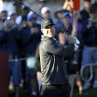 Brooks Koepka, seen watching his tee shot on the 10th hole during the Shriners Hospitals for Children Open in Las Vegas on Thursday, missed the cut after an even-par 71 on Friday. | AP