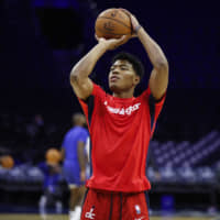 Wizards rookie Rui Hachimura warms up before a preseason game against the 76ers on Friday in Philadelphia. | AP