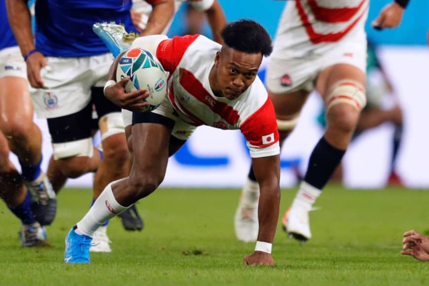 Japan's Kotaro Matsushima runs with the ball against Samoa in a Rugby World Cup Pool A match at the City of Toyota Stadium on Saturday. | AFP-JIJI