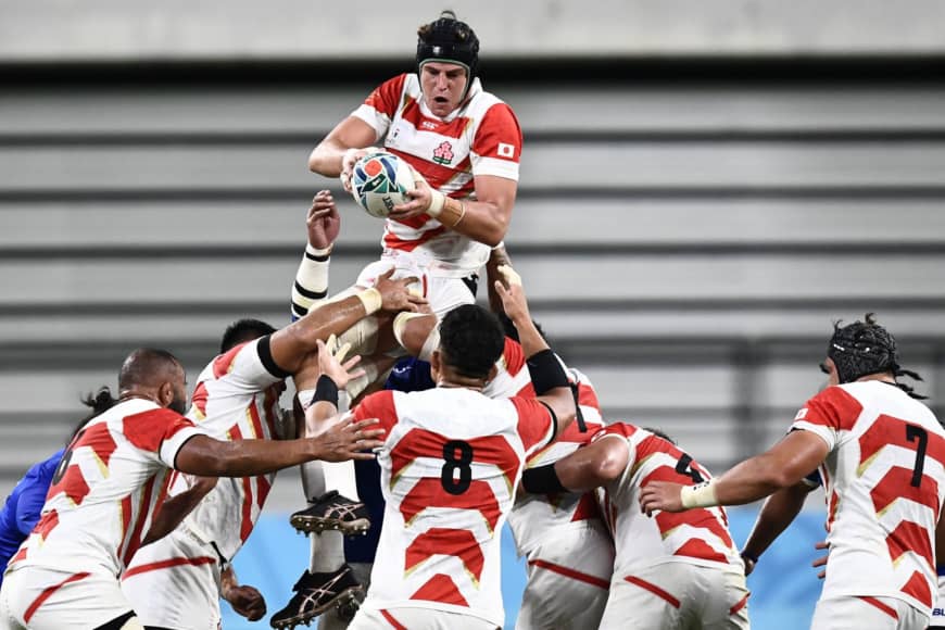 Japan's James Moore jumps for the ball in a lineout during Saturday's match against Samoa. | AFP-JIJI