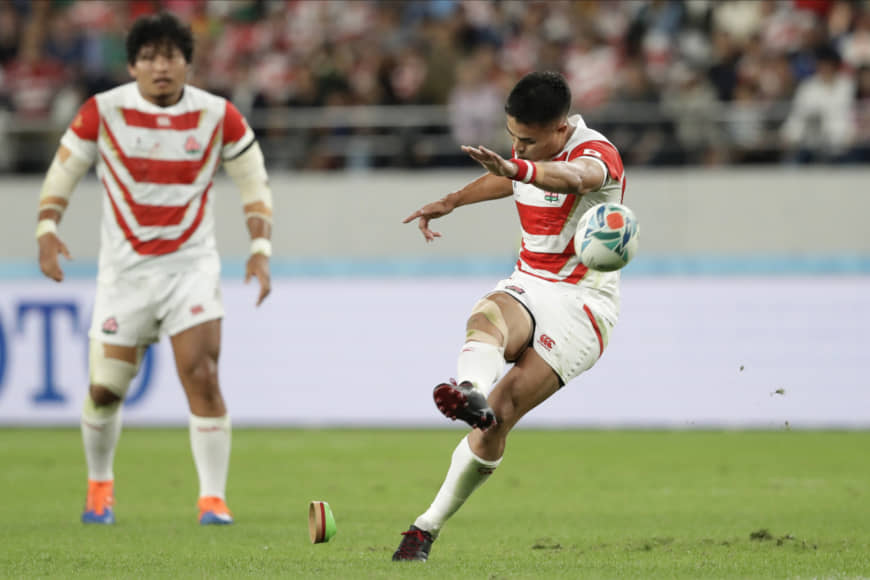 Japan's Yu Tamura kicks a penalty goal against South Africa in their Rugby World Cup quarterfinal on Sunday night. | AP