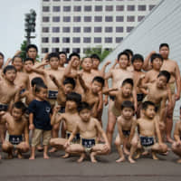 Members of Komatsuryu Dojo pose on Aug. 13, 2013, in Tokyo. | JOHN GUNNING