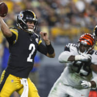 Steelers quarterback Mason Rudolph passes in the first half against the Bengals on Monday in Pittsburgh. | AP