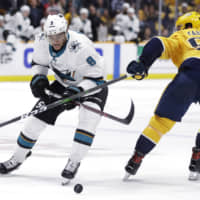 The Sharks\' Evander Kane (left), seen in a file photo, had five points against the Hurricanes on Wednesday in San Jose. | AP
