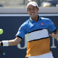 Kei Nishikori, seen in action at the U.S. Open in August, underwent surgery on his right elbow on Tuesday and will miss the rest of the ATP season. | AP