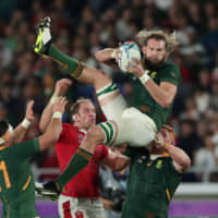 South Africa\'s RG Snyman comes down with the ball during his team\'s semifinal against Wales at the Rugby World Cup on Sunday in Yokohama. | REUTERS
