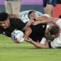 New Zealand\'s Ardie Savea scores the team\'s lone try on Saturday. | REUTERS