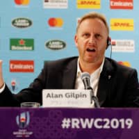 World Rugby Chief Operating Officer and Tournament Director Alan Gilpin, speaking a news conference in Tokyo on Thursday, announces that two games set for Saturday will be canceled due to an approaching typhoon. | REUTERS