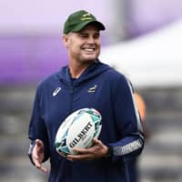 South Africa coach Rassie Erasmus takes part in a training session in Urayasu, Chiba Prefecture, on Tuesday. | AFP-JIJI