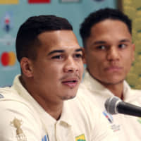 South Africa\'s Cheslin Kolbe (left) and Herschel Jantjies attend a news conference in Tokyo on Wednesday ahead of Sunday\'s Rugby World Cup quarterfinal against Japan | AP