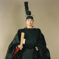 Prince Naruhito in traditional attire to celebrate his coming of age in February 1980. | KYODO