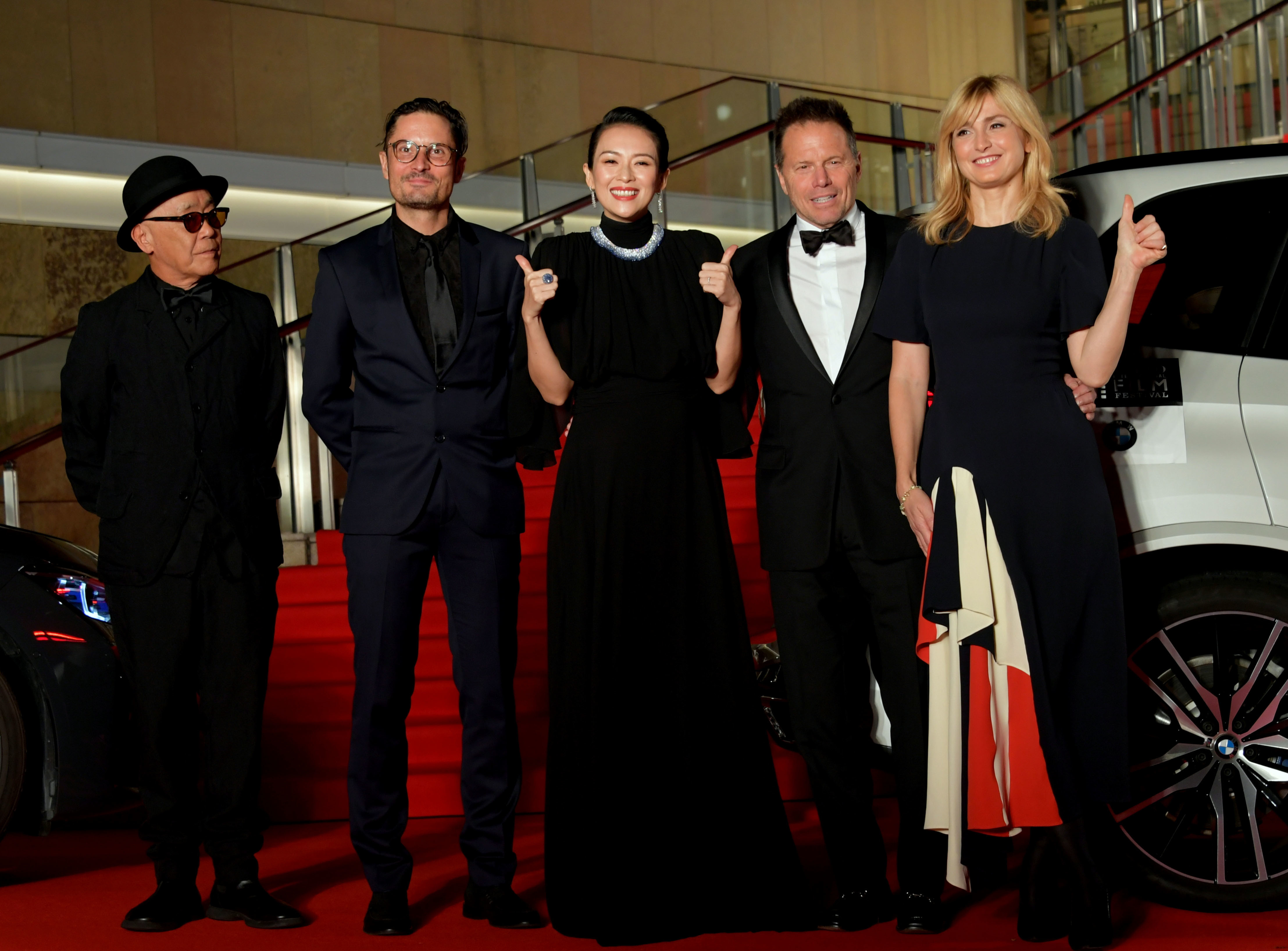 Actress Zhang Ziyi (center), president of the International Competition Jury for the Tokyo International Film Festival 2019, poses together with other jury members during the event's opening ceremony in the Roppongi district of Tokyo on Monday. | YOSHIAKI MIURA