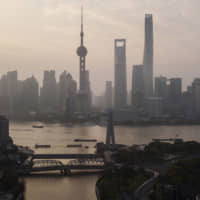 Chinese regulators are strengthening scrutiny on the country\'s cryptocurrency industry, ordering firms to halt operations. | PHOTOGRAPHER: QILAI SHEN/BLOOMBE
