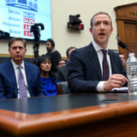 Facebook Chairman and CEO Mark Zuckerberg testifies at a House Financial Services Committee hearing in Washington in October. | REUTERS
