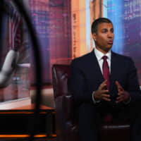 Ajit Pai, chairman of the Federal Communications Commission (FCC), speaks during a Bloomberg Television interview in New York on Tuesday. Pai discussed security concerns surrounding Chinese network vendors, the potential merger of T-Mobile US Inc. and Sprint Corp., and political advertising on social media. | BLOOMBERG