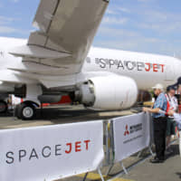 Mitsubishi Aircraft Corp.\'s SpaceJet is displayed at the International Paris Air Show in Le Bourget, near Paris, on June 18. | KYODO