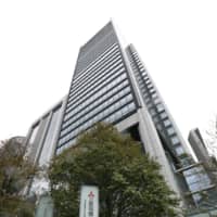 The suicide in 2017 of an employee at a unit of Mitsubishi Electric Corp. was work-related, a labor standards office has concluded. The office recognized that the employee did more than 100 hours of overtime per month while in a supervisory position. The headquarters of Mitsubishi Electric Corp. is seen here in central Tokyo. | KYODO