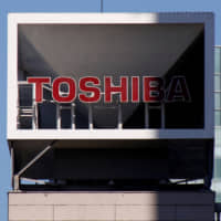 Toshiba Corp., which is continuing its reform efforts following the bankruptcy of its U.S. nuclear power subsidiary in 2017, reported a net loss Wednesday of &#165;145.15 billion for the April-September period. | REUTERS