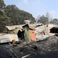 A burned home near Colo Heights, northwest of Sydney, is pictured Saturday. | AAP IMAGE/DAN HIMBRECHTS / VIA REUTERS