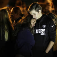 Students from Saugus High School and nearby Valencia High attend a vigil at Central Park on Thursday in Santa Clarita, California. | AP