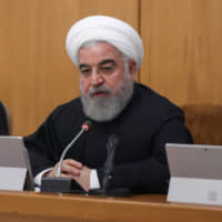 Iranian President Hassan Rouhani speaks during the Cabinet meeting in Tehran on Wednesday. | VIA REUTERS