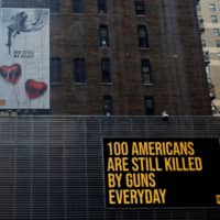 This \"wall of demand\" mural and video message in New York City were created by Manuel Oliver, the father of Joaquin Oliver, one of the 17 people killed in the 2018 school shooting at Marjory Stoneman Douglas High School in Parkland, Florida. | REUTERS