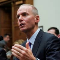 Boeing Chief Executive Dennis Muilenburg testifies before the House Transportation and Infrastructure Committee during a hearing on the grounded 737 Max in the wake of deadly crashes, on Capitol Hill in Washington Oct. 30. | REUTERS