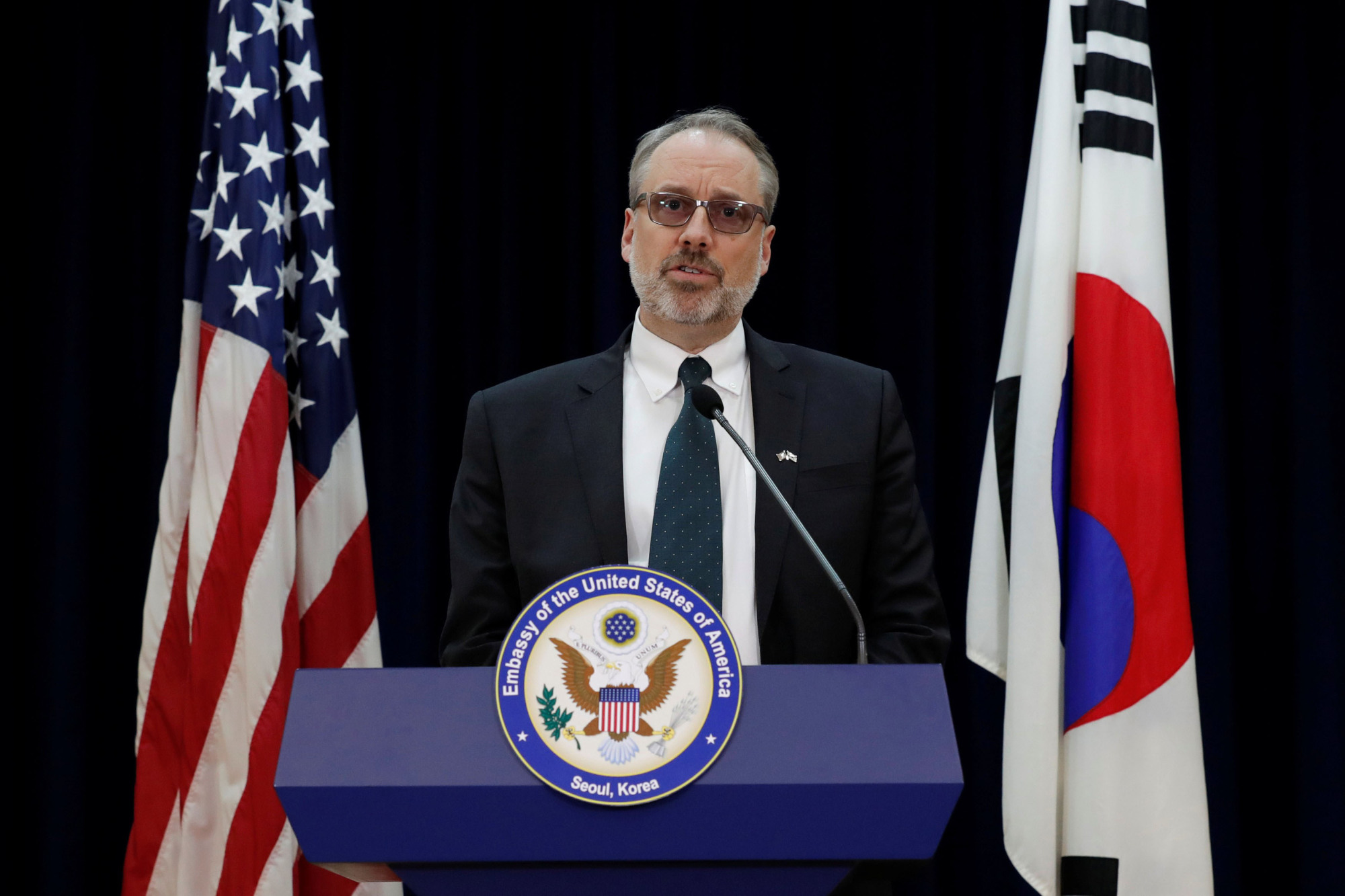 James DeHart, the top U.S. negotiator in talks with South Korea on a new cost-sharing agreement for hosting the U.S. military, speaks at the American Embassy in Seoul on Tuesday after meeting with his South Korean counterpart. | REUTERS