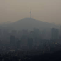 Haze obscures the Seoul skyline in this file photo. | AFP-JIJI