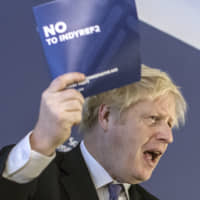 Britain\'s Prime Minister Boris Johnson launches the Scottish Conservative\'s manifesto whilst on the general election campaign trail, in North Queensferry Fife, Scotland, on Tuesday. Britain goes to the polls on Dec. 12. | AP