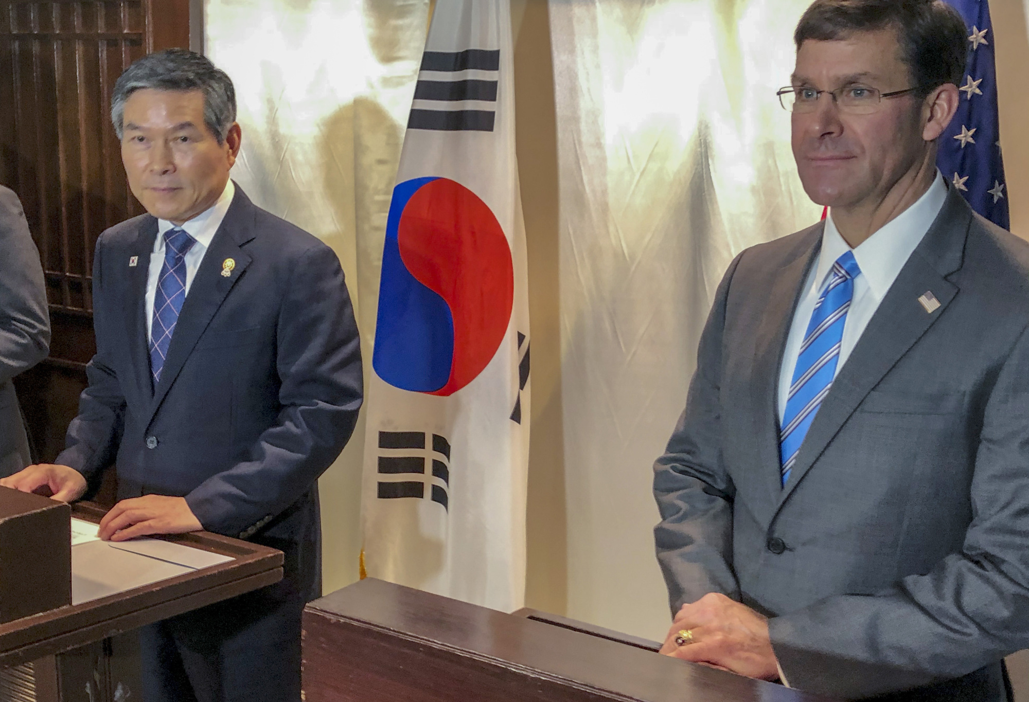 U.S. Defense Secretary Mark Esper and his South Korean counterpart, Jeong Kyeong-doo, give a news conference in Bangkok on Sunday. | AP