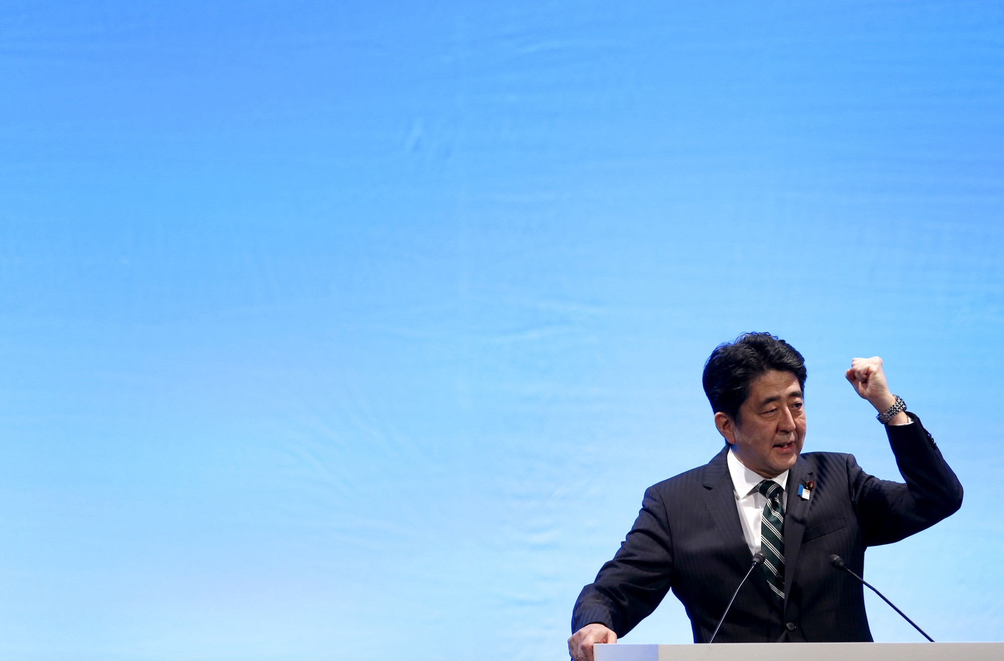Prime Minister Shinzo Abe delivers a speech to the Liberal Democratic Party during the LDP's annual convention in Tokyo in March 2013. | AP